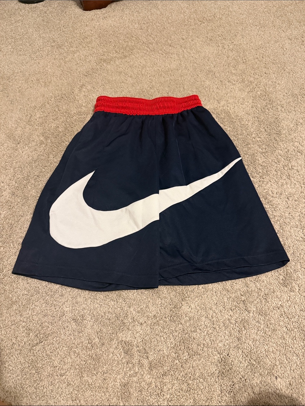 Nike Navy Athletic Shorts with Red Waistband and White Swoosh